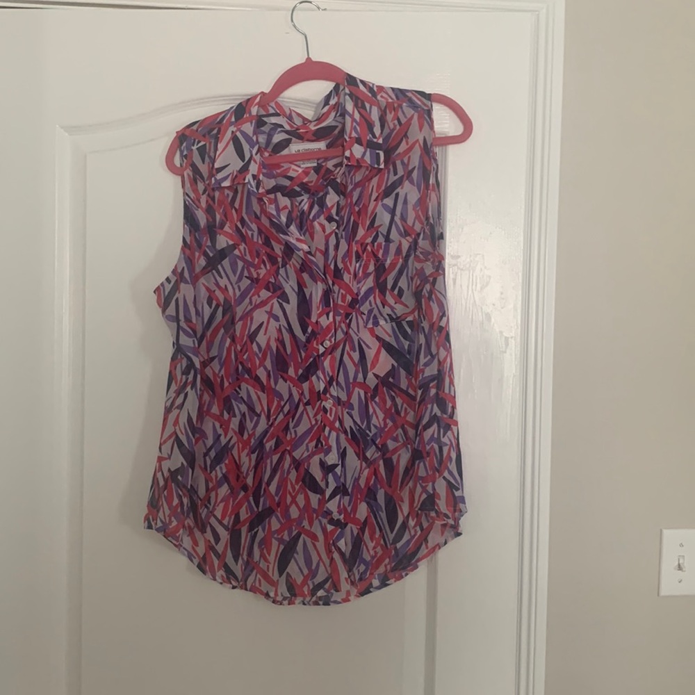 Button down multi colored sleeveless blouse.